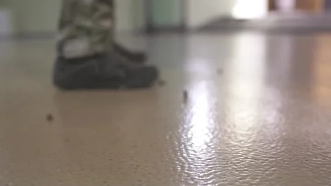 Ammunition falls to the floor. Fired shell casings from a machine gun. Stock Footage 239358934