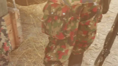 Ammunition, machine gun and flask of the Swiss soldier at the historical fest Video stock 58813643