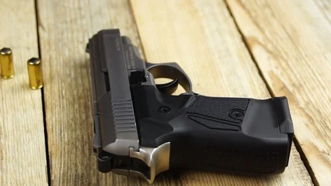 Ammunition with traumatic pistol Stock Footage 105704232