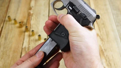 Ammunition with traumatic pistol Stock Footage 105704446