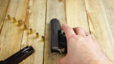 Ammunition with traumatic pistol Stock Footage 105704587