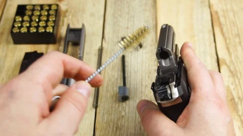 Ammunition with traumatic pistol Stock Footage 105705012