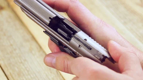 Ammunition with traumatic pistol Stock Footage 105706142