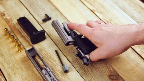 Ammunition with traumatic pistol Stock Footage 105706909