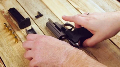 Ammunition with traumatic pistol Stock Footage 105707185