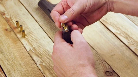 Ammunition with traumatic pistol Stock Footage 105708094