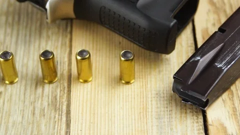 Ammunition with traumatic pistol Stock Footage 105708945