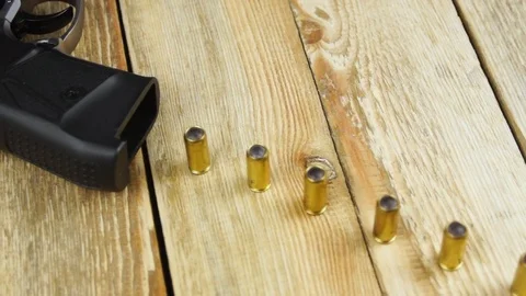 Ammunition with traumatic pistol Stock Footage 105709406