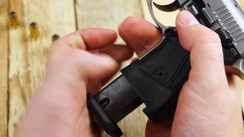 Ammunition with traumatic pistol Stock Footage 105709954