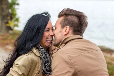 Amorous couple on a park bench Stock Photos