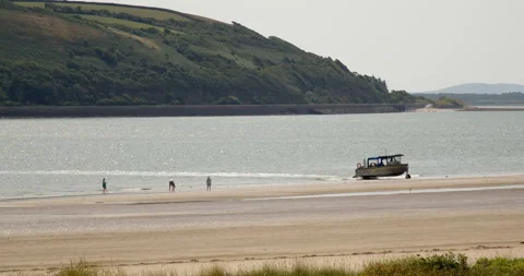 Amphibious ferry driving onto sand Stock Footage 227132083