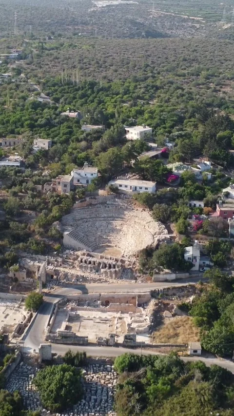 Amphitheater in ancient city of the Agora. Dramatic sunset sky. Mersin, Turkey Stock Footage 248920596