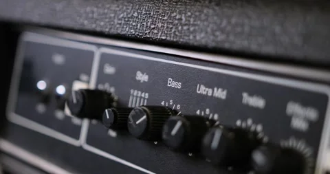 Amplifier knobs close-up at sound recording studio 動画素材 231202852