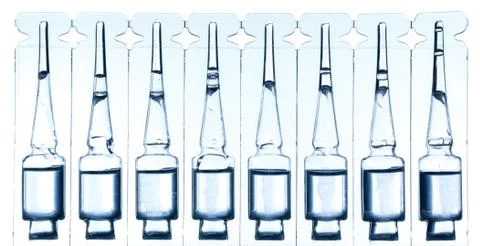 Ampoule with a liquid for injection isolated on white Stock Photos