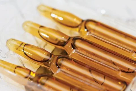 Ampoule, Phials on cardiogram background Stock Photos