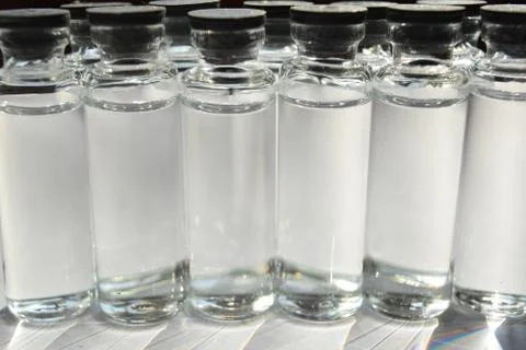 Ampoules with clear solution. Stock Photos