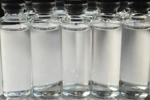 Ampoules with clear solution. Stock Photos