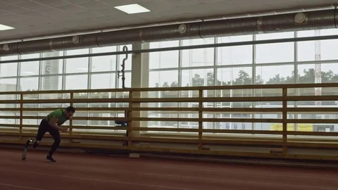 Amputee Athlete Exercising in Stadium Stock Footage 72139545