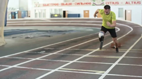 Amputee Athlete Starting from Blocks Stock Footage 62057250