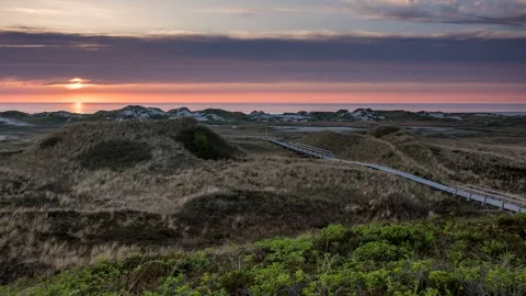 Amrum island, Germany: Time lapse of sunset at the beach of Amrum Stock Footage 318830737