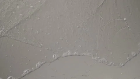 Amrum: Small waves on sand Stock Footage 141656337