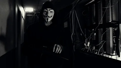 Amsterdam - Aug 16 2017: Hacker with Anonymous Vendetta Mask Video stock 78935317