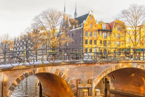 Amsterdam canal and bicycles Stock Photos