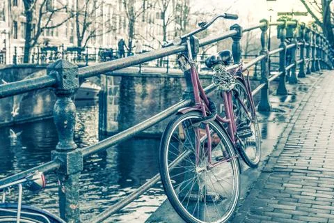 Amsterdam canal and bicycles Stock Photos