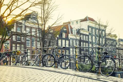 Amsterdam canal and bicycles Stockfoto's