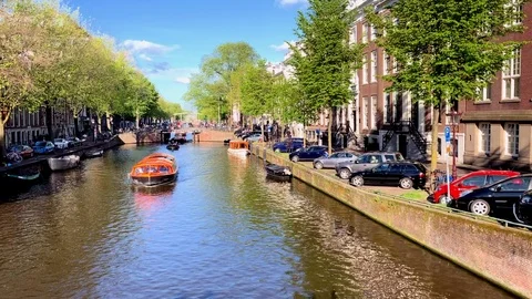 Amsterdam Canal with Boats, Spring Morning Stock Footage