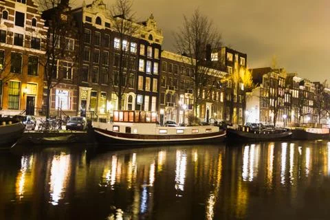 Amsterdam canal at night Stock Photos