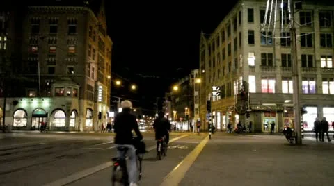 Amsterdam city center by night in the Netherlands Stock Footage