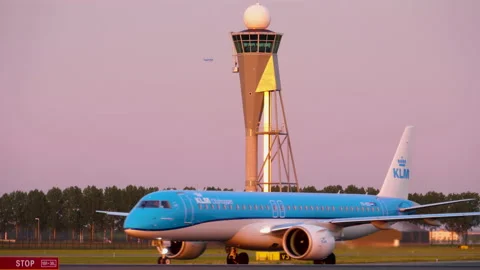 AMSTERDAM - JUN 3, 2022: KLM Cityhopper Airplane taxiing to Schiphol runway 3 Stockbeeldmateriaal 196706273