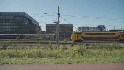 Amsterdam Metro Train passing by Stock Footage 193688724