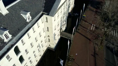 Amsterdam, Netherlands Flag on the old building. Drone City flight Stock Footage 227060167