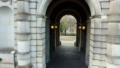 Amsterdam, Netherlands Flight inside the old historical arch by Drone Stock Footage 234451738