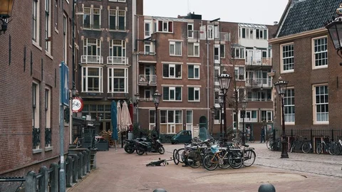 Amsterdam, Netherlands - March 2020: Empty historical city downtown without Stock Footage 128402870