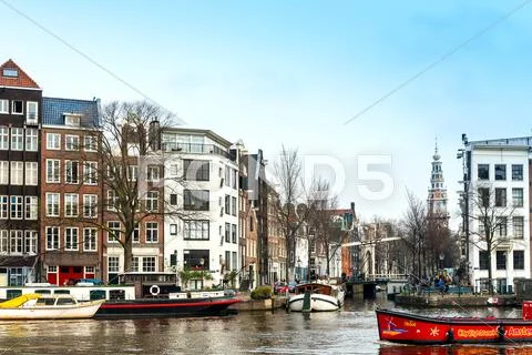 Amsterdam, Netherlands - March 31, 2016 : Beautiful street view of Traditiona Stock Photos