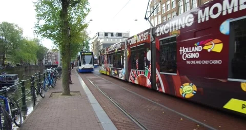 Amsterdam, Netherlands. Trams on Singel. View of De Krijtberg. Stock Footage 145718461