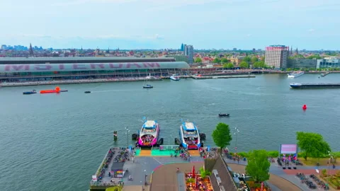 Amsterdam North Ferry to Central Station Drone Flight 4K Netherlands Video stock 334540281