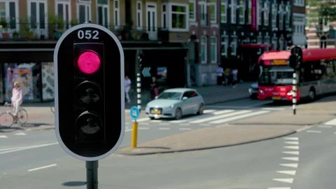 Amsterdam Red Traffic Light At Busy City Intersection 動画素材 337374982