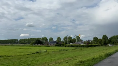 Amsterdan Forest, road through fields in peaceful countryside under cloudy sky Stock-Footage 342753953