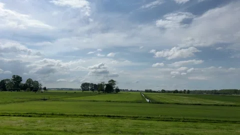 Amsterdan Forest, serene open field with clouds under a cloudy sky, aerial view Stock Footage 342752663