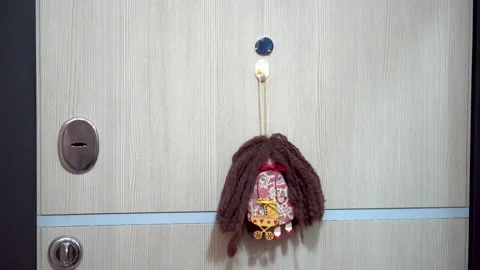 Amulet hanging on the door Stock Footage 153780959