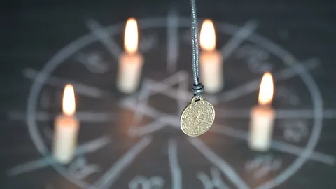 Amulet of predictions in the palm of your hand on the background of magic. Stock-Footage 124355371