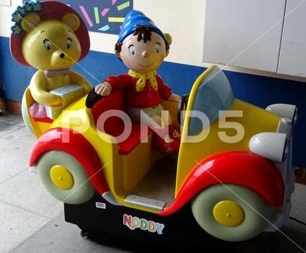 Amusement Arcade Noddy Car Ride For Children Stock Photos