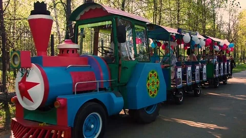 Amusement park. Carousel. Children's train. Stock Footage 109117283