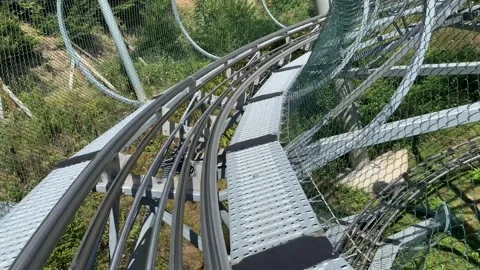 Amusement park extreme roller coaster ride Stock Footage 247931377