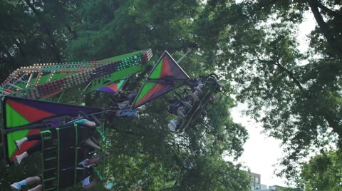 Amusement park flying ride Stock Footage 44350138