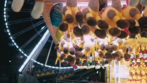 Amusement park locations. Hanging soft toys - awards for well-aimed shots Stock Footage 243190882